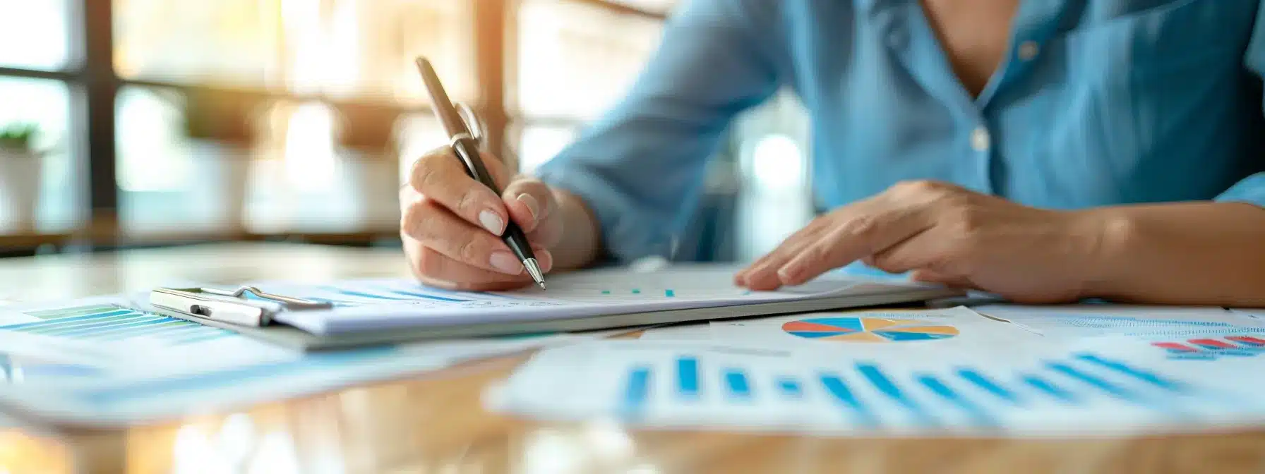 a focused nursing home staff meeting unfolds in a well-lit conference room, where engaged caregivers exchange insights on improving dementia care quality through training program assessments, surrounded by charts and feedback forms on a sleek wooden table.